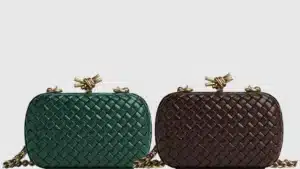 four key designer pieces bags to own bottega veneta knot clutch